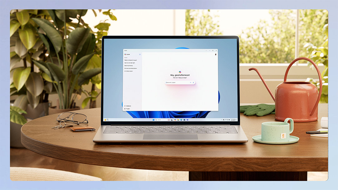 A Windows laptop showing the Copilot app sitting on top of a table