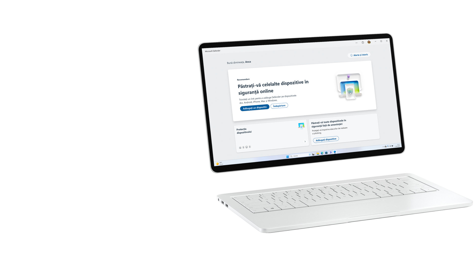 Un ecran de computer care afișează fereastra Microsoft Defender, cu o tastatură lângă acesta